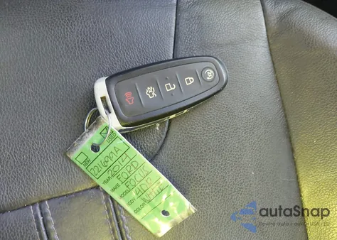 2014 Ford Focus Titanium from USA, damaged, VIN 1FADP3J27EL221699